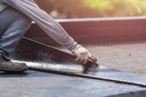 Professional Basement Waterproofing technician working in Vienna, VA